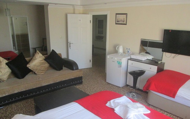 Imagen de la habitación del La Fontaine Guzelyali Hotel. Foto 11