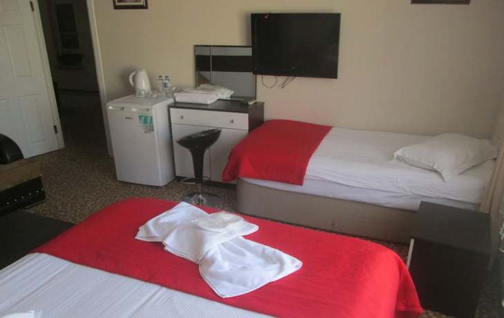 Imagen de la habitación del La Fontaine Guzelyali Hotel. Foto 12