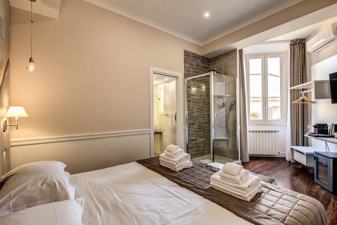 Imagen de la habitación del La Foresteria Luxury Suites. Foto 2