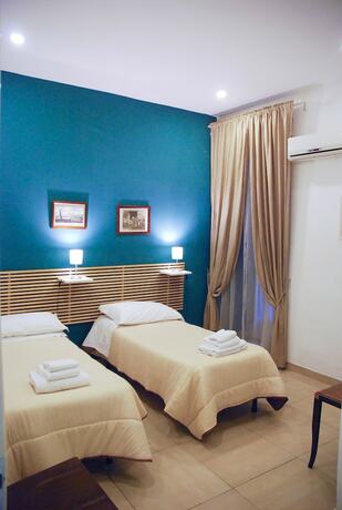 Imagen de la habitación del La Locanda dell\'Arte-Piazza Dante. Foto 14