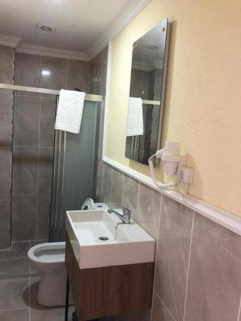 Imagen de la habitación del La Pera Suites. Foto 2