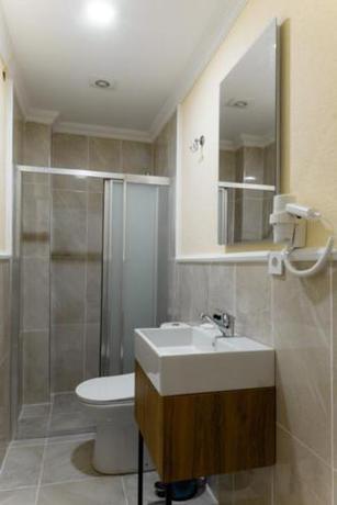 Imagen de la habitación del La Pera Suites. Foto 7