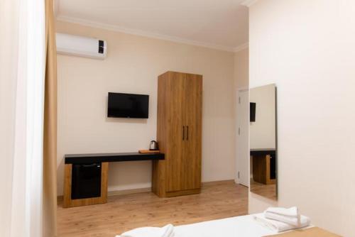 Imagen de la habitación del La Pera Suites. Foto 8