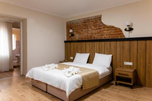 Imagen de la habitación del La Pera Suites. Foto 9