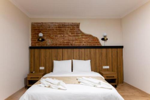 Imagen de la habitación del La Pera Suites. Foto 10
