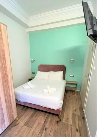 Imagen de la habitación del La Perle Hotel. Foto 15