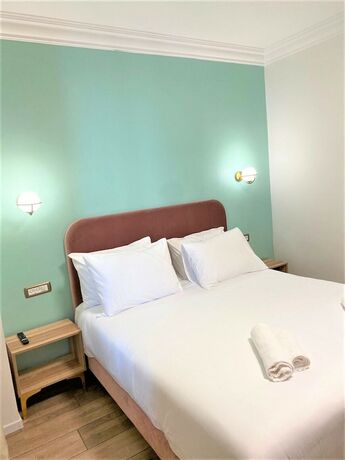 Imagen de la habitación del La Perle Hotel. Foto 16