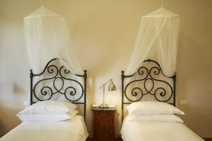 Imagen de la habitación del La Pescaia Resort. Foto 13