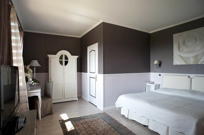 Imagen de la habitación del La Petite Auberge. Foto 13