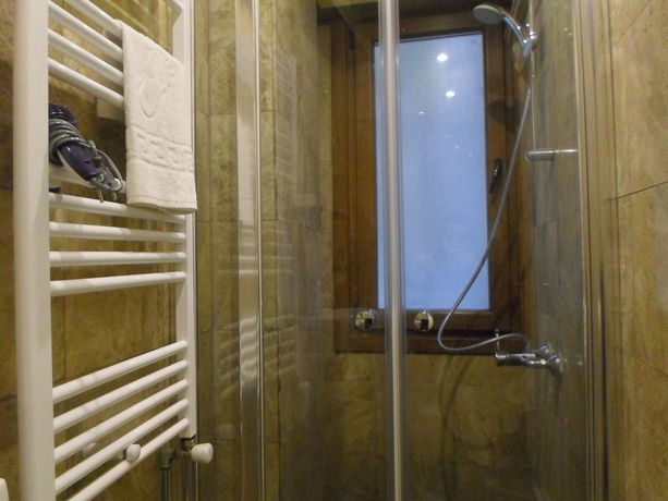 Imagen de la habitación del La Petite Maison. Foto 1