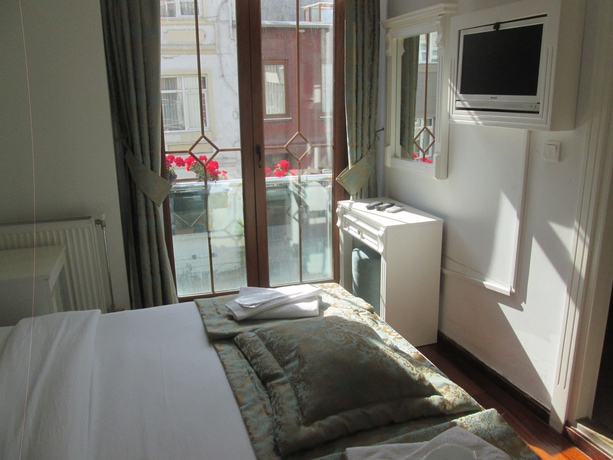 Imagen de la habitación del La Petite Maison. Foto 9