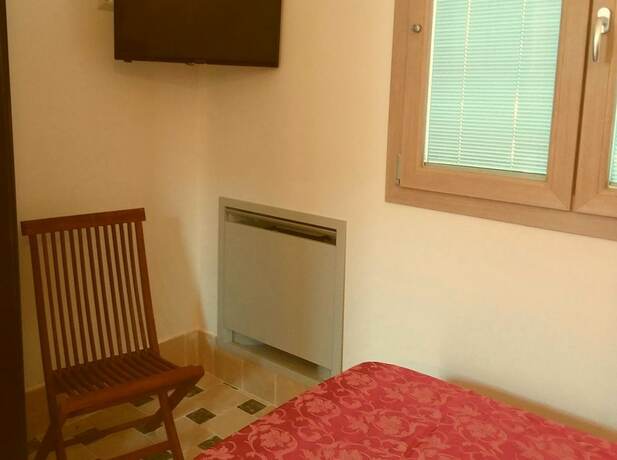 Imagen de la habitación del La Trottoria. Foto 19