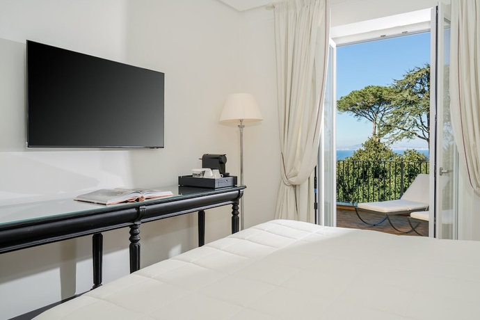Imagen de la habitación del La Tuja Relais du Parc. Foto 6