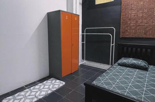 Imagen de la habitación del La Wood Homestay near Kuala Besut Jetty. Foto 14