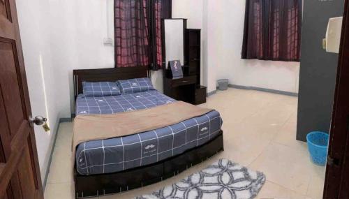 Imagen de la habitación del La Wood Homestay near Kuala Besut Jetty. Foto 15