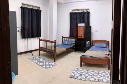 Imagen de la habitación del La Wood Homestay near Kuala Besut Jetty. Foto 16