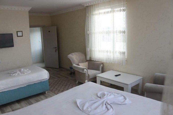 Imagen de la habitación del Lacin Apart Hotel. Foto 15