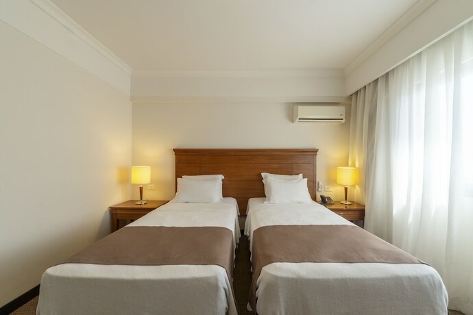 Imagen de la habitación del Laghetto Villa Moura. Foto 20
