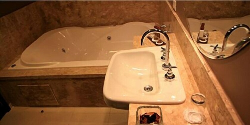 Imagen de la habitación del Laghetto Villa Moura. Foto 25