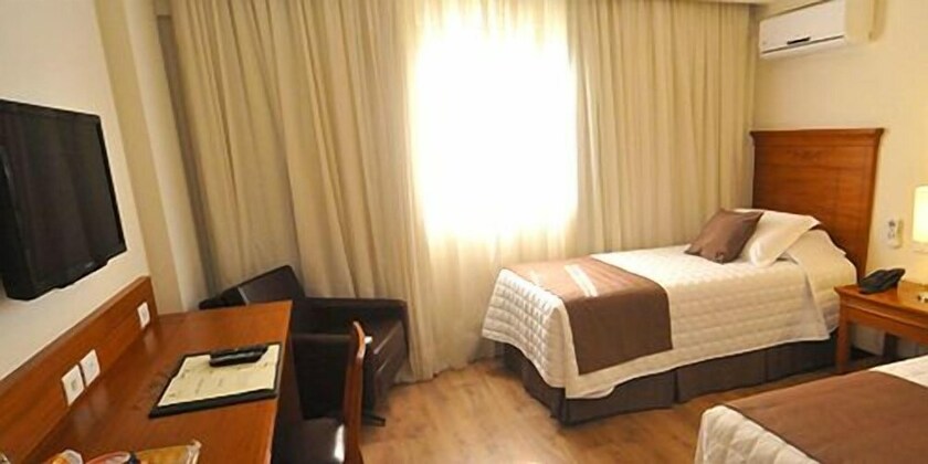 Imagen de la habitación del Laghetto Villa Moura. Foto 27