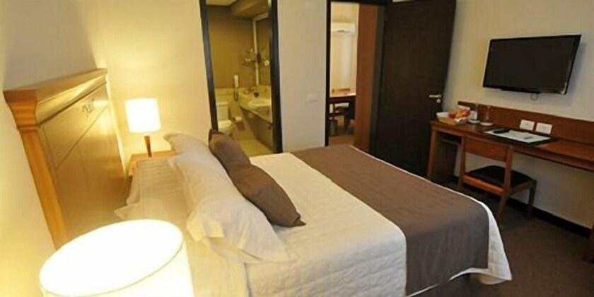 Imagen de la habitación del Laghetto Villa Moura. Foto 34