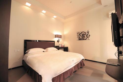 Imagen de la habitación del Lagom Gulangyu Stay Boutique Inn. Foto 5