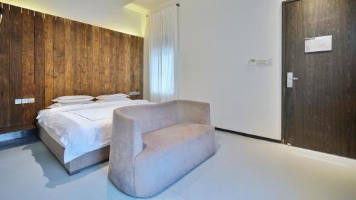 Imagen de la habitación del Lagom Gulangyu Stay Boutique Inn. Foto 9
