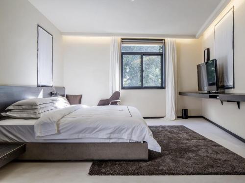 Imagen de la habitación del Lagom Gulangyu Stay Boutique Inn. Foto 10