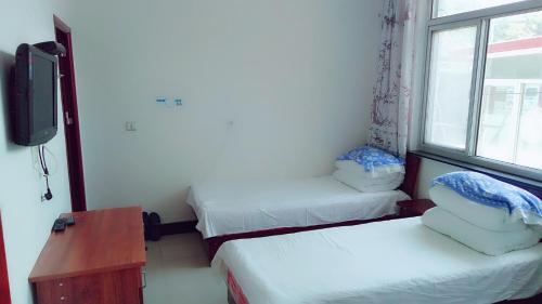 Imagen general del Laiyuan Baishi Mountain Liangcheng Farm Stay. Foto 1