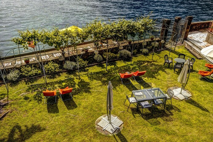 Imagen de la habitación del Lake Como Beach Resort and Villas. Foto 25