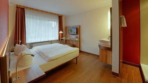 Imagen de la habitación del Landhotel Zur Eiche. Foto 8