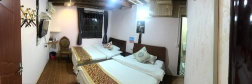 Imagen general del Langzhong Ancient Town Qinyou Inn. Foto 5