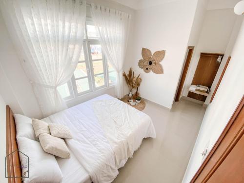 Imagen de la habitación del Lantana Homestay. Foto 17
