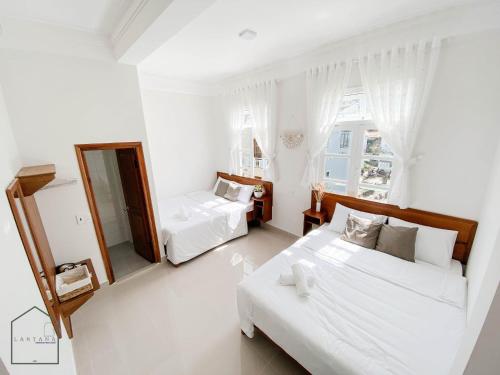 Imagen de la habitación del Lantana Homestay. Foto 18