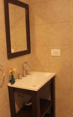 Imagen de la habitación del Laprida Suites. Foto 15