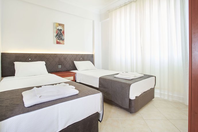 Imagen de la habitación del Larimar Suite Hotel. Foto 11