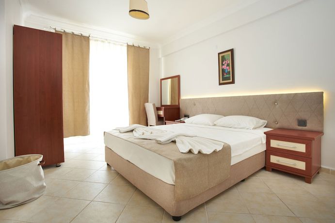 Imagen de la habitación del Larimar Suite Hotel. Foto 15