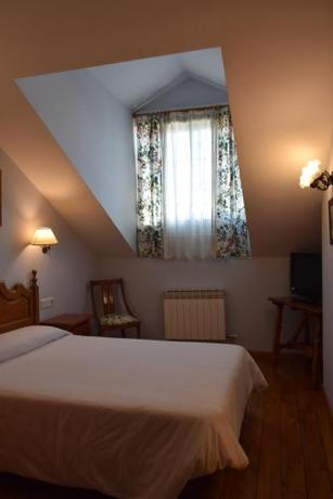 Imagen de la habitación del Las Casitas del Jardín. Foto 18