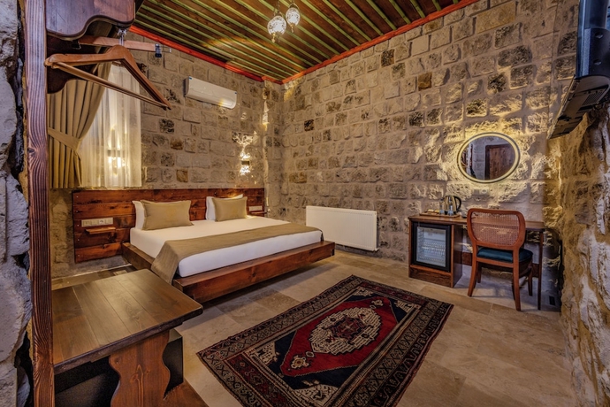Imagen de la habitación del Latona Stone Palace. Foto 8