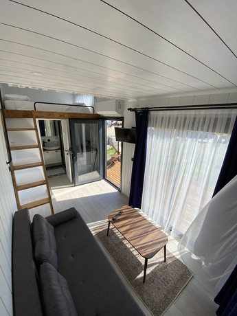 Imagen de la habitación del Lavira Tiny House Village. Foto 11
