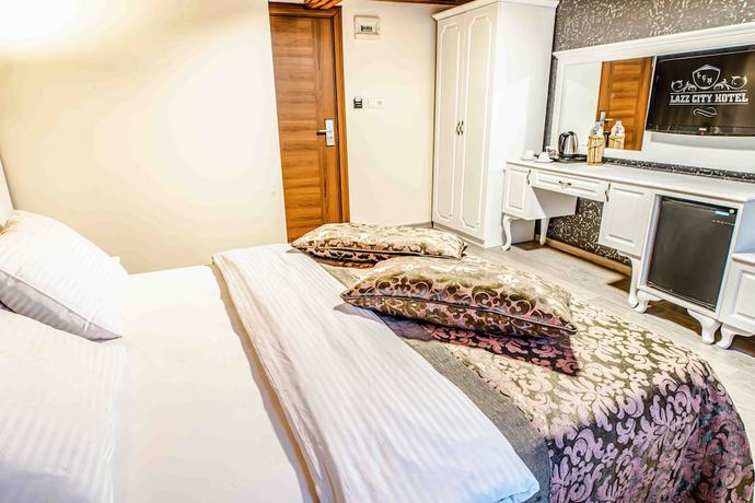 Imagen de la habitación del Lazz City Hotel. Foto 2