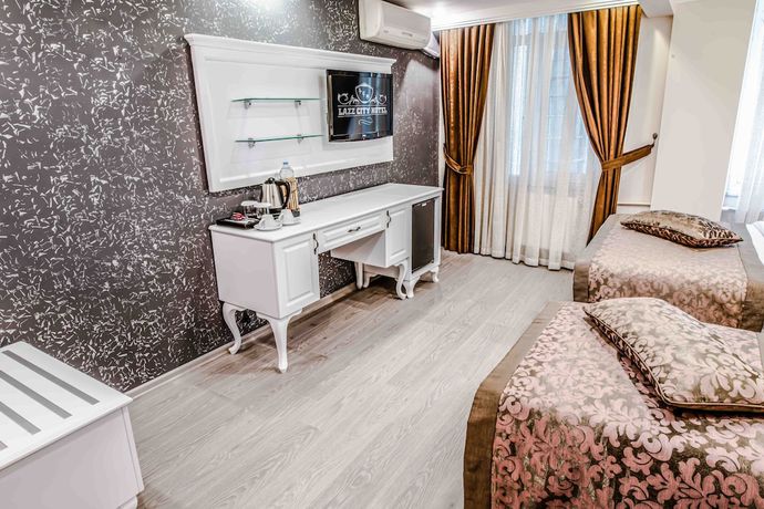 Imagen de la habitación del Lazz City Hotel. Foto 9