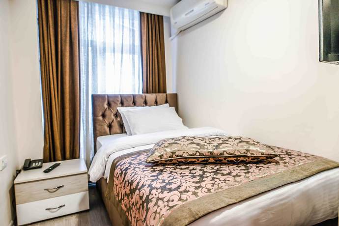 Imagen de la habitación del Lazz City Hotel. Foto 11