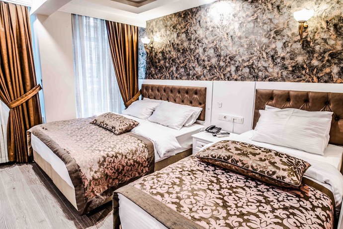 Imagen de la habitación del Lazz City Hotel. Foto 12