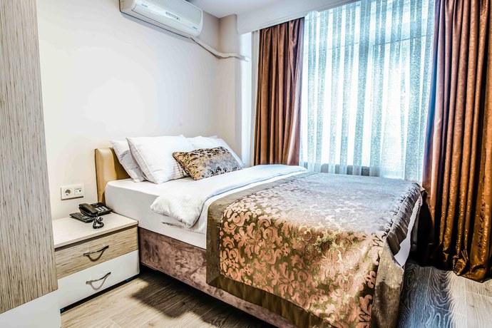 Imagen de la habitación del Lazz City Hotel. Foto 13