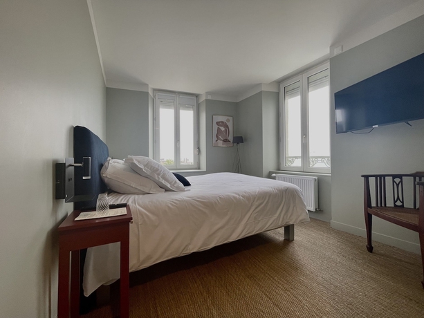 Imagen de la habitación del Le Beau Rivage, Luc sur Mer. Foto 14