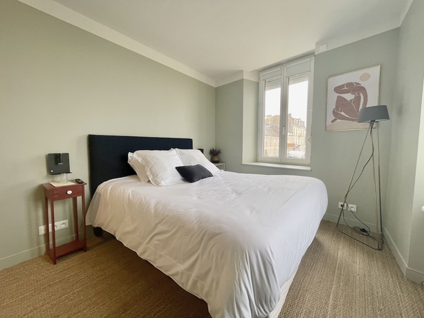 Imagen de la habitación del Le Beau Rivage, Luc sur Mer. Foto 15