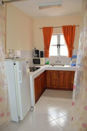 Imagen de la habitación del Le Capricorne Villas. Foto 10