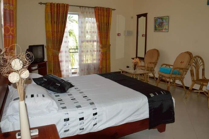 Imagen de la habitación del Le Capricorne Villas. Foto 11