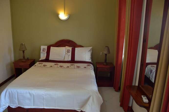 Imagen de la habitación del Le Capricorne Villas. Foto 13